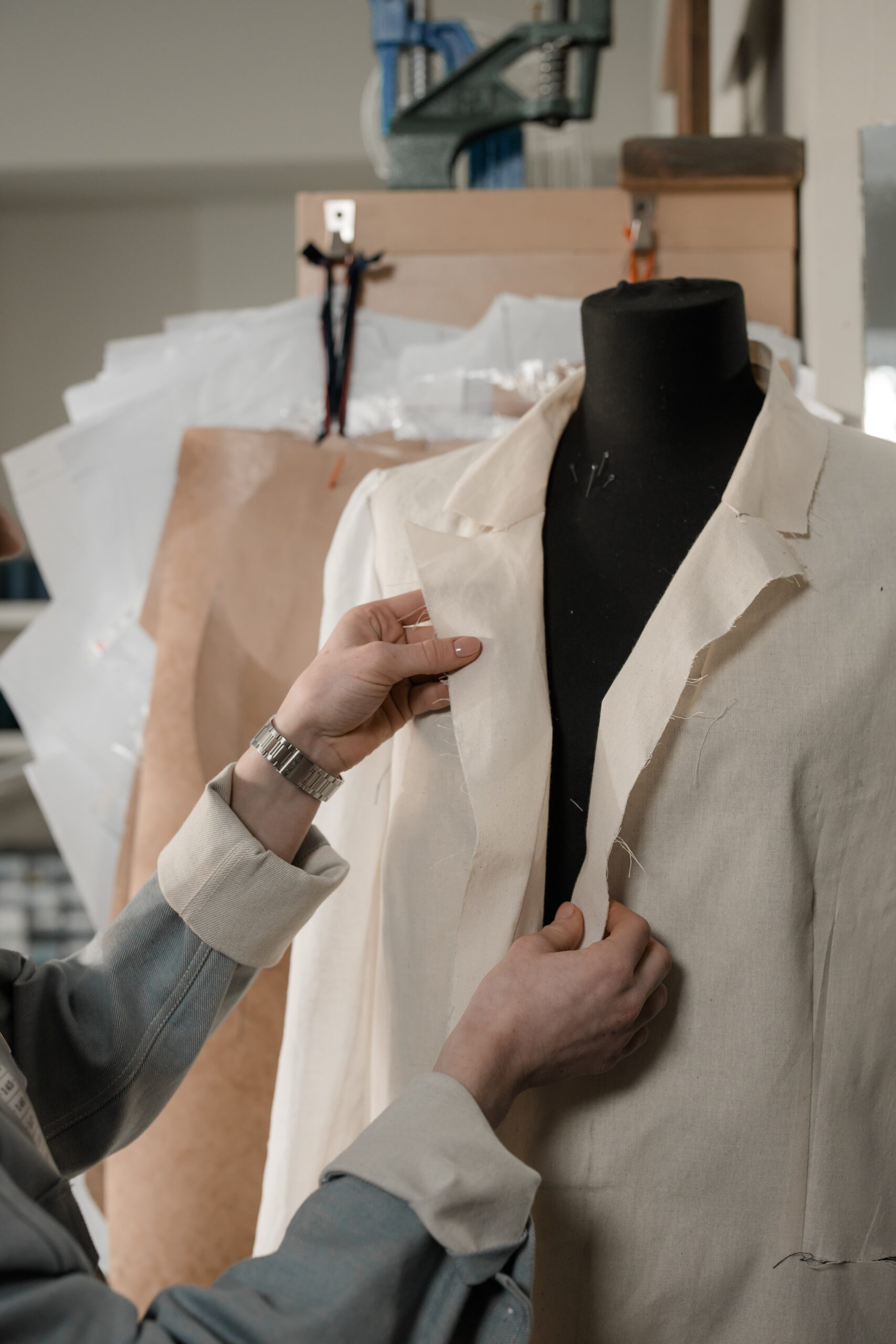 Fitting a garment on a tailor's mannequin